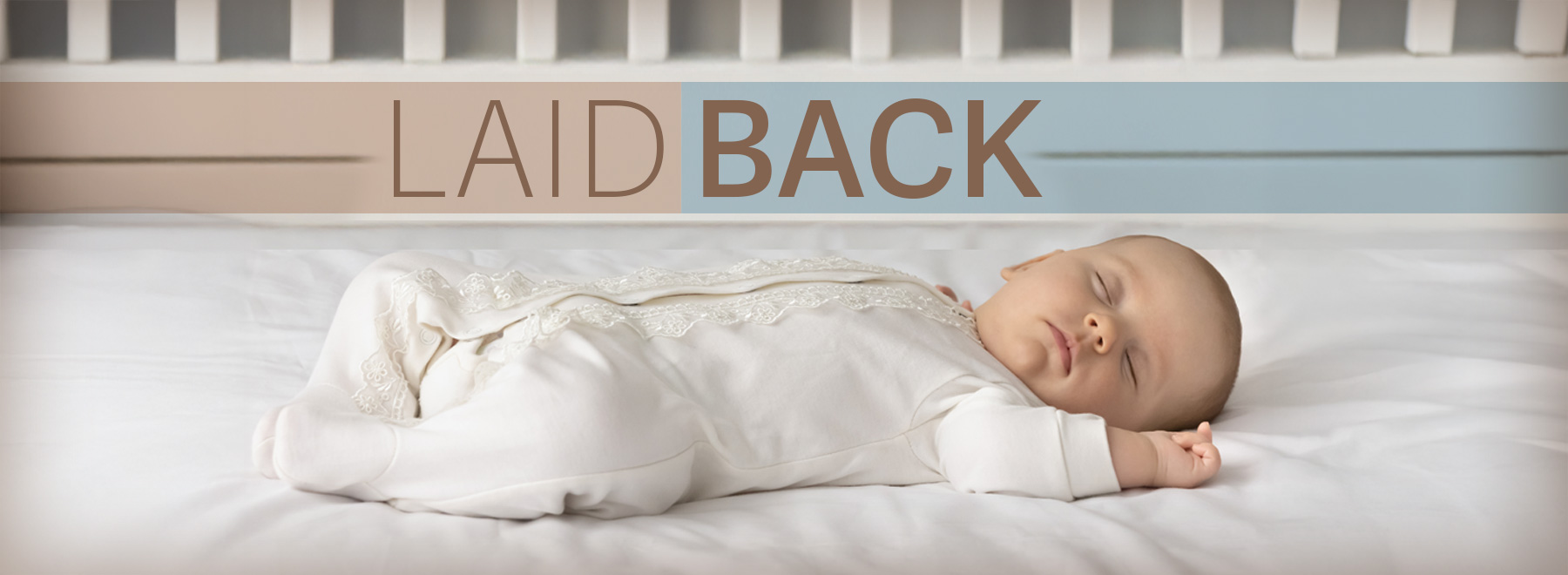 An infant in a crib with the words "laid back," highlighting the recommendation to place babies on their backs while sleeping.